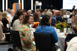 Luncheon guests enjoying conversation at table 34
